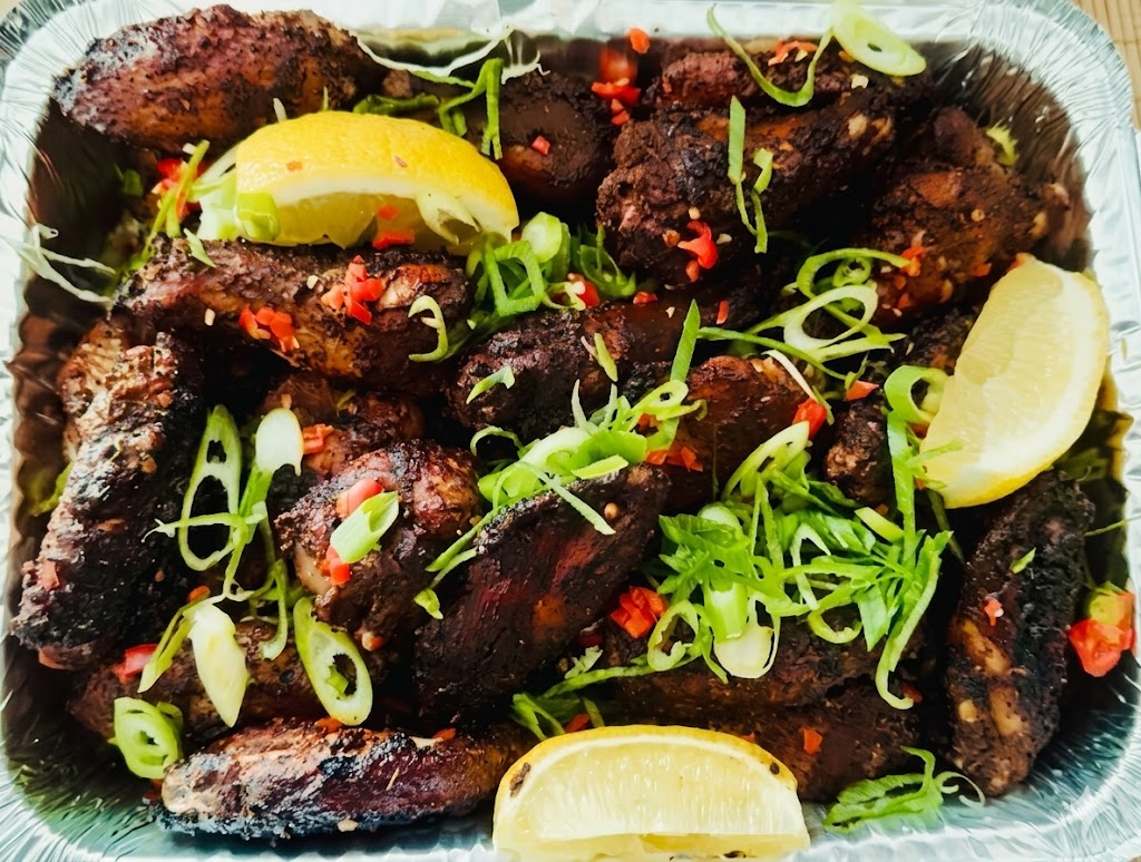 Jerk Chicken Quarter meal box